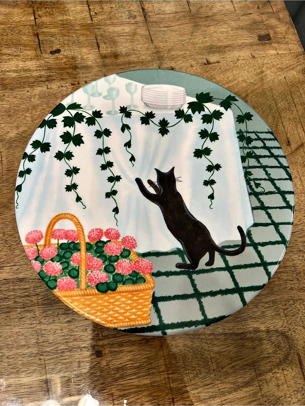 vintage Mebel Italy melamine round plate trivet featuring a black cat